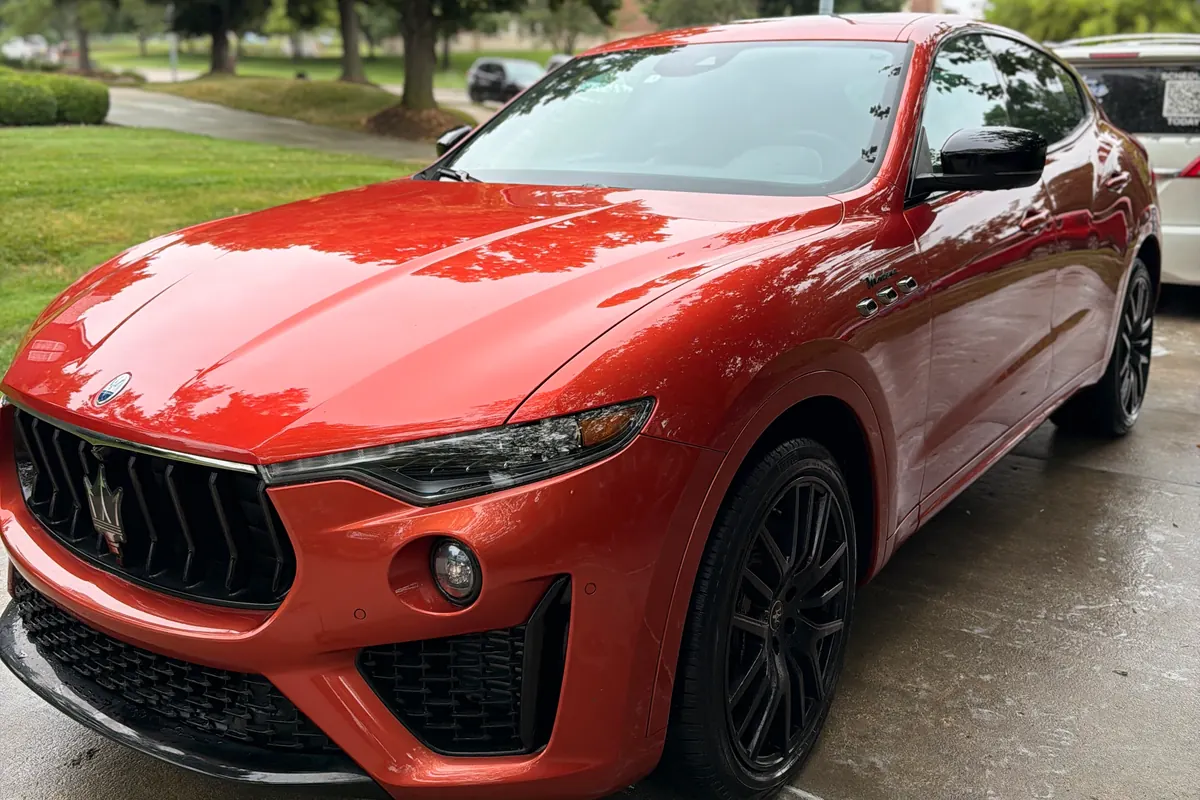 Red Maserati Levante with glossy, freshly washed and protected paint